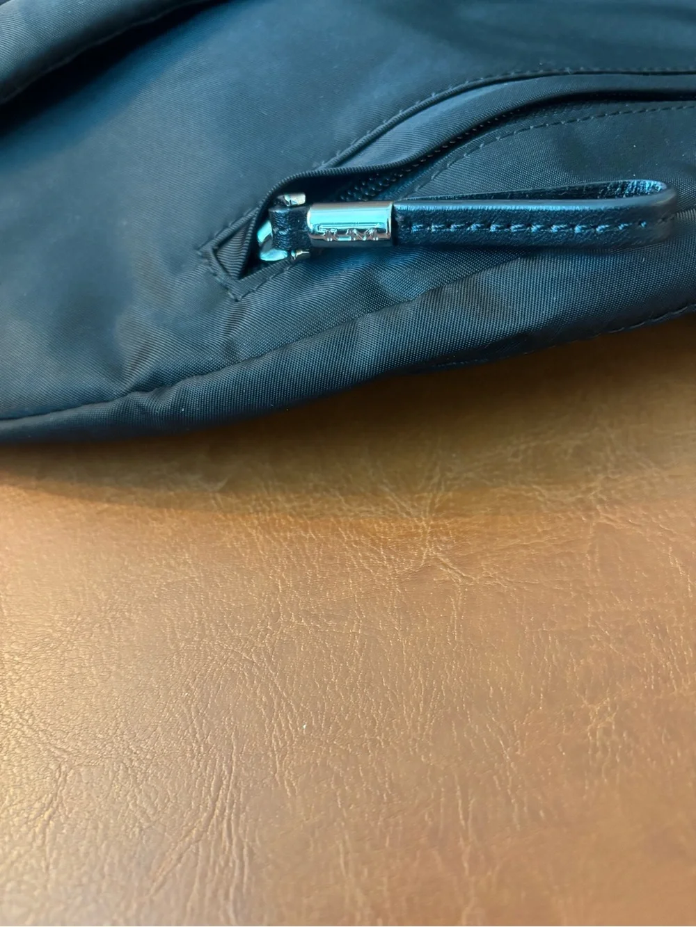 Tumi compact sling